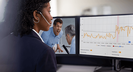 Woman looking at analytics on the computer screen