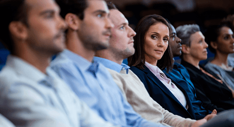 a group of people at a conference
