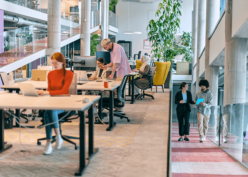 People working in colorful modern startup office
