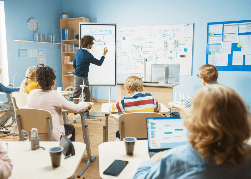 Classroom with teacher using electronic screen