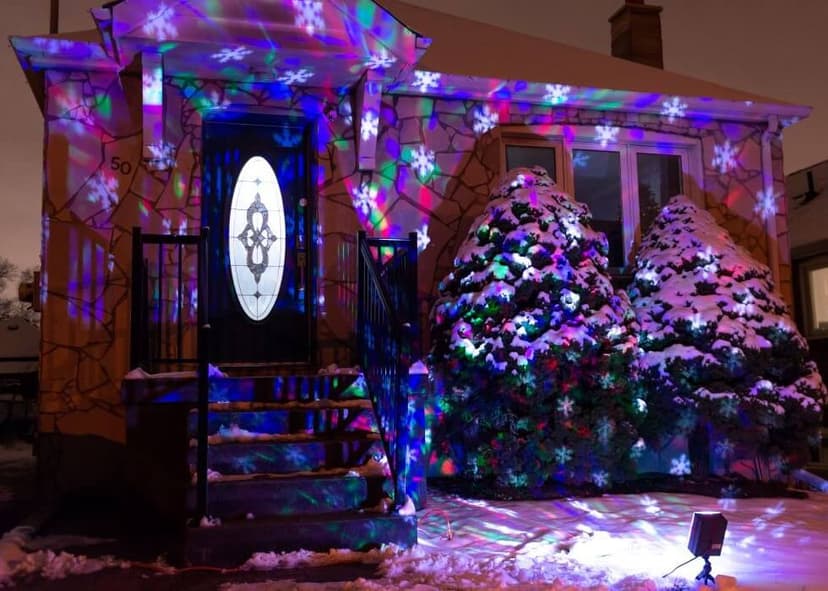 Christmas lights projected on a house